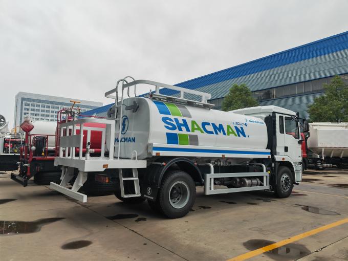 Rear side view of Shacman L5000 water bowser truck showing safety ladder and pump layout